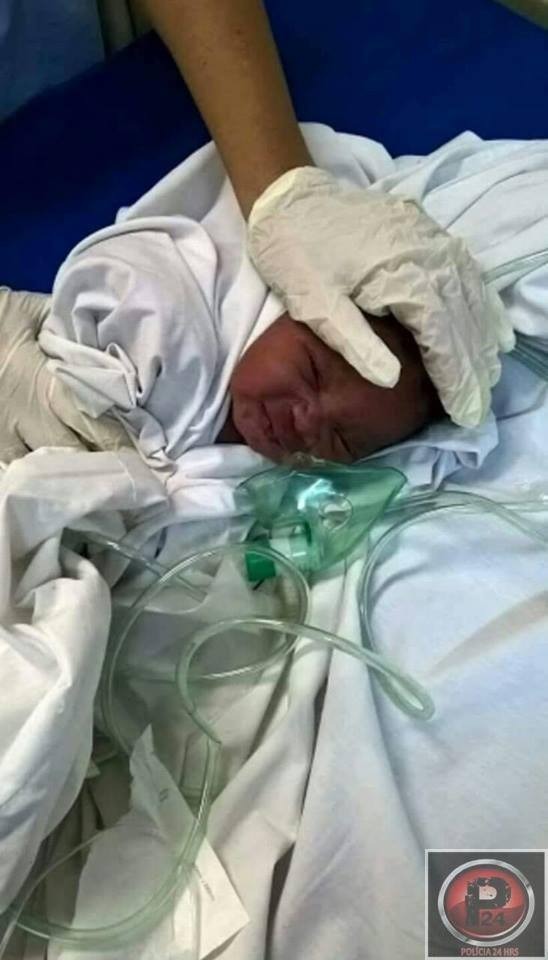 BEBÊ É ENCONTRADO EM CAIXA DE PAPELÃO